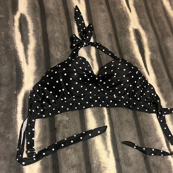 This is a polka dot swim top. - Picture 2 of 3